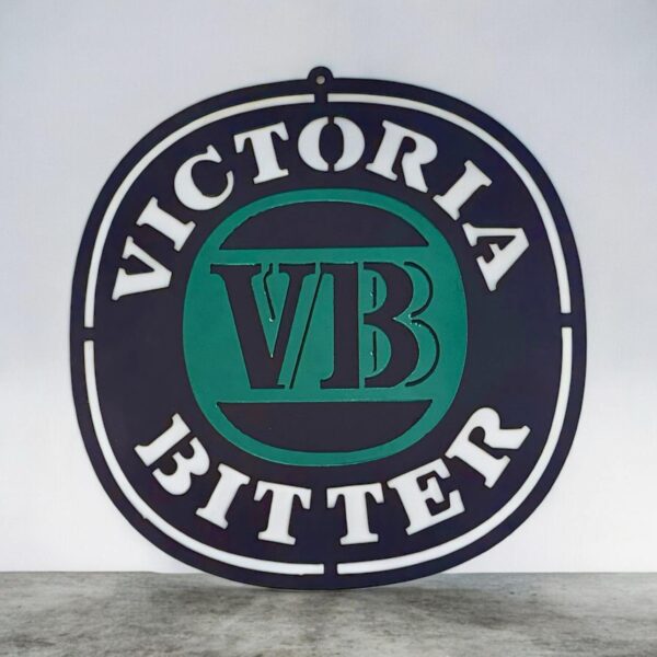A circular Victoria Bitter (VB) beer logo sign with white text on a green and black background.